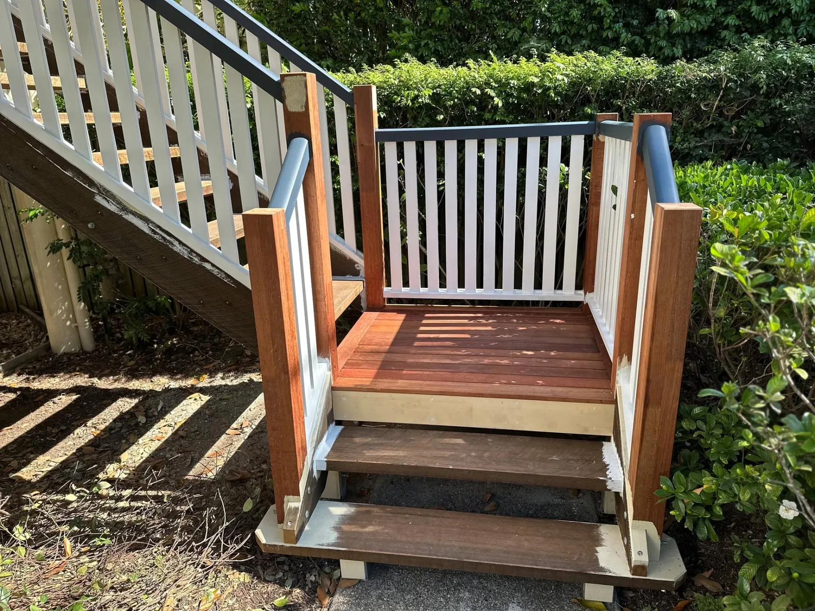 Timber entry stairs and painted balustrade built by DJL Building & Maintenance